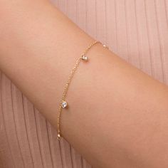 Crafted in Solid Gold, this simulated diamond bracelet is great for any occasion and it makes a perfect gift for your beloved faces.Explore our collection of Solid Gold Bracelets in competitive prices. Home Page: https://www.etsy.com/shop/ByGema ♥♥ GEMSTONES ● ZIRCON: Dimensions -> 3mm (approx. 0.12in). This Bracelet has 5 stones. Please keep in mind that the dimensions and the weight may slightly vary. ♥♥ MATERIALS This piece of my Jewels Collection is made of 9 karats or 14 karats solid gold u Elegant Bracelet With Delicate Cubic Zirconia Chain, Elegant Bracelets With Delicate Cubic Zirconia Chain, Elegant Cubic Zirconia Bracelet With Delicate Chain, Dainty Cubic Zirconia Bracelets With Brilliant Cut, Dainty Diamond Cut Tennis Bracelet, Dainty Cubic Zirconia Diamond Cut Bracelet, Dainty White Gold Cubic Zirconia Bracelet, Diamond Bracelet With Delicate Chain For Gift, Diamond Delicate Chain Bracelet Gift