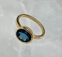 Large Oval London Blue Topaz Ring in 14K Solid Gold Bezel Set Amazing Color About 4-5 Grams Large 6x8 MM Oval Stone Genuine Blue Topaz in London Blue Color Faceted and Transparent Beautiful Deep Blue Color Stackable Solid Gold in 14 Karat (Not Plated or Filled). FREE Shipping in USA Blue Oval Topaz Ring With Bezel Setting, Oval Topaz Ring In 14k Gold With Bezel Setting, Blue Oval Birthstone Ring With Bezel Setting, Oval Blue Topaz Ring, Ring Bezel, London Blue Topaz Ring, Tanzanite Ring, Hammered Gold, Black Spinel