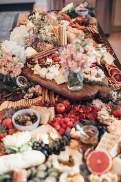 a table covered with lots of different types of food