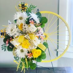 a bouquet of flowers in front of a wheel