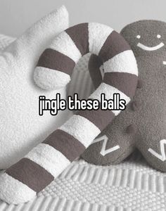 two stuffed animals sitting next to each other on top of a bed with the words single these balls