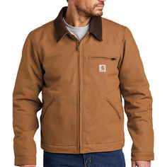 The original Detroit Jacket built a reputation for toughness on the backs of warehouse workers, farmhands and ranchers across America. With its signature corduroy collar and heavyweight fabric, this updated Detroit jacket is a rugged layer worthy of any job.    12-ounce, firm hand, 100% ring spun cotton duck canvas  Water-repellent and wind-resistant  Blanket-lined body for warmth  Quilted nylon sleeve lining for easy on-and-off  Corduroy-trimmed collar with hidden snaps for optional hood   Two- Detroit Jacket, Carhartt Detroit, Duck Canvas, Work Wear Women, Work Shirts, Zip Sweatshirt, Work Pants