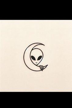 an alien is sitting on top of a crescent with its head in the middle of it