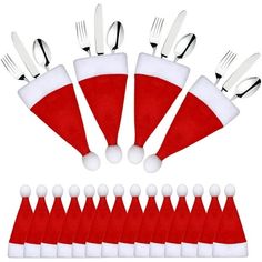 a bunch of forks and spoons with santa hats on them