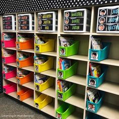 the shelves are full of books and magazines for children's library patrons to read