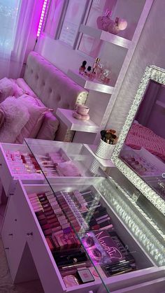 the vanity is filled with makeup and other beauty products in it's display case