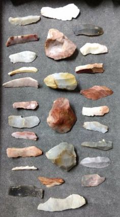 several different types of rocks on a tray