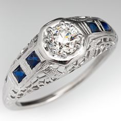 a diamond and blue sapphire engagement ring