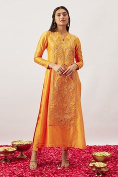 Orange straight kurta with floral embroidery using zari, dori, applique work. Paired with a pant and dupatta with tassels. - Aza Fashions Raw Silk Kurta With Dori Work For Reception, Reception Kurta With Dori Work In Raw Silk, Reception Raw Silk Kurta With Dori Work, Art Silk Kurta For Navratri Reception, Art Silk Kurta For Reception And Navratri, Navratri Reception Raw Silk Kurta, Navratri Tussar Silk Kurta With Dori Work, Festive Straight Silk Thread Kurta, Festive Silk Thread Straight Kurta