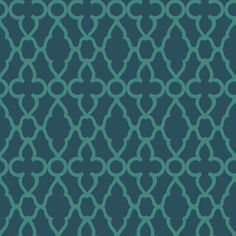 a blue and green wallpaper with an intricate trellis pattern on the back ground