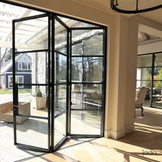 the inside of a house with glass doors