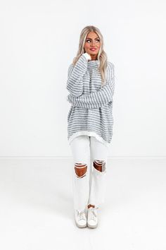 - This new sweater is giving cozy casual vibes! - Lightweight, grey and white knit material - Turtle neckline - Long sleeves with ribbed cuffs - Relaxed silhouette that ends in a straight hemline with ribbed detail Heather Grey Knit Long Sleeve Sweater, Heather Grey Knit Sweater For Winter, Heather Grey Long Sleeve Knit Sweater, Gray Textured Knit Sweater For Fall, Trendy Gray Soft Knit Sweater, Trendy Soft Knit Gray Sweater, Trendy Gray Chunky Knit Sweater, Gray Turtleneck Sweater For Spring, Oversized Heather Grey Cozy Sweater