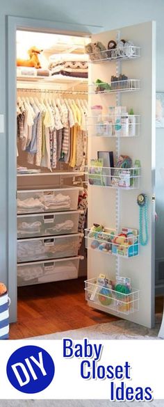 an open closet with baby clothes and other items in the closet, next to a bed