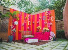 an outdoor area decorated with bright colors and decorations