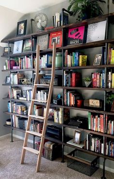 a ladder leaning against a book shelf filled with books