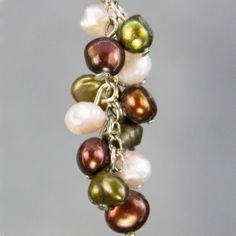 "The colorful dangling chandelier earrings are handmade using fresh water pearl. Perfect gift for any occasion! Free U.S shipping! Anni Designs. A colorful palette could be pastel or vibrant. The pastel color palette is soft and sophisticated, the vibrant color palette is vigorous and infectious. They both could go with many outfits due to the rich mixture of different colors. The length of the earrings is: 1 ¼ inches, or 3.0 cm. (excluding the length of hook) Customers who purchased the earring Handmade Pearl Chandelier Earrings Gift, Multicolor Pearl Earrings As A Gift, Multicolor Handmade Pearl Earrings For Gift, Handmade Multicolor Pearl Earrings For Gift, Handmade Multicolor Pearl Earrings Gift, Multicolor Pearl Earrings Set As A Gift, Handmade Multicolor Pearl Drop Earrings, Multicolor Pearl Drop Earrings For Gift, Gift Pearl Charm Dangle Chandelier Earrings