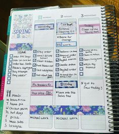 an open planner with flowers on it and the words spring written in pink, blue and green