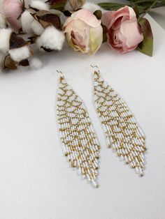 "Bridal beaded earrings, abstract white and gold seed beaded earrings, statement boho earrings, wedding jewelry Length 5\" including ear wire Width 1\" Made with best quality Japanese seed beads and 24k gold dipped seed beads Lightweight and unique extravagant style - designed and made by Luba Ro Colors used - glossy white and gold Select closure earwires leverbacks clip-ons (for non-pierced ears)" White And Gold Beaded Earrings, Elegant Beaded Cream Earrings, Handmade White Beaded Wedding Earrings, Elegant Cream Beaded Earrings, Unique White Earrings With Large Beads, Blue Beaded Earrings, Gold Dipped, Seed Bead Earrings, Metal Beads