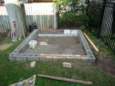 the backyard is being built and ready to be used as an outdoor space for gardening