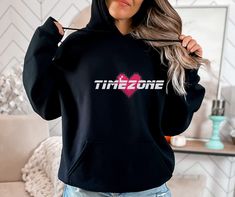 Timeszone hoodie, t shirt, crop top or tee shirt. Maneskin rocks! Now you can too! Maneskin merch. T-shirt and Tank top are Bella and canvas brand. All Shirts are printed with ink, not cheap itchy vinyl.  This unisex heavy blend hooded sweatshirt is relaxation itself. Made with a thick blend of cotton and polyester, it feels plush, soft and warm, a perfect choice for any cold day. In the front, the spacious kangaroo pocket adds daily practicality while the hood's drawstring is the same color as Lgbtq Shirts, Gay Rights, What A Beautiful Day, Damiano David, Hispanic Heritage Month, Hispanic Heritage, Holiday Sweatshirt, Youth Hoodies, Nouvel An