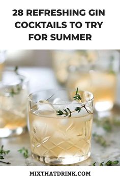 two glasses filled with gin cocktails and garnished with rosemary sprigs