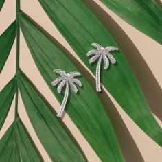 The Oasis Palm Stud Earrings are a great addition to any collection. Close your eyes and imagine summer breezes and exotic destinations, such as Moroccan souks and Mexican beaches. Available in silver and gold, these etched palm tree earrings are the symbol of holidays taken and yet to be experienced.   Also available in Gold Plated Sterling silver including posts Handmade Hypo-allergenic and nickel free Handmade jewellery made from sterling silver, brass, bronze, and mixed metals require regula Close Your Eyes And Imagine, Mexican Beaches, Tree Earrings, July Birthstone Jewelry, August Birthstone Jewelry, Earring Tree, Gifts For New Mums, Pearl Jewellery Earrings, Jewelry Ring Box