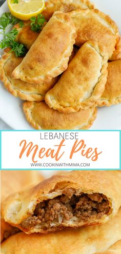 some meat pies on a plate with lemon wedges