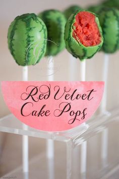 red velvet cake pops with watermelon on top and pink paper in the middle