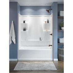 a bathroom with blue walls and white fixtures