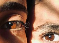 two people with brown eyes looking in the same direction