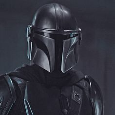 the star wars character is wearing a helmet