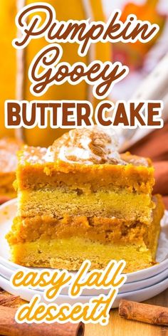 pumpkin gooey butter cake on a plate with cinnamon sticks