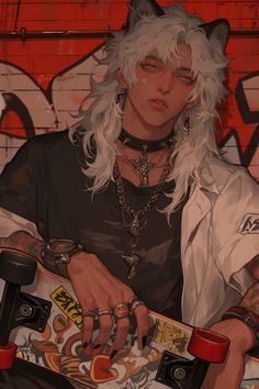 a man with white hair holding a skateboard in front of a graffiti covered wall