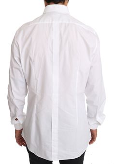 Dolce & Gabbana formal shirt. Model: GOLD, formalColor: White Fitting: Slim fit Logo details Made in Italy Material: 100% Cotton Designer Fitted Tops For Business, Luxury Slim Fit Tops For Formal Occasions, Designer Slim Fit Semi-formal Tops, Designer Slim Fit Top For Semi-formal Occasions, Designer Slim Fit Dress Shirt For Formal Occasions, Fitted Designer Dress Shirt For Formal Occasions, Designer Fitted Dress Shirt For Formal Occasions, Formal Fitted Tops With Hidden Button Closure, Luxury Cotton Formal Tops