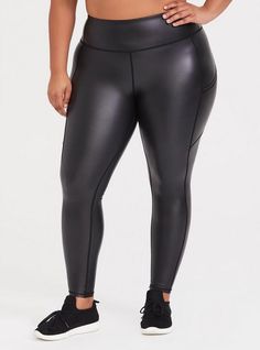 A coated, faux leather-inspired legging features a full length and a tummy-smoothing waistband that holds you in for all day comfort. Matching style(s): Search 12024115High waist. Wide stretch waistband. Tapered leg. Side pockets. CONTENT + CAREPolyester/rayon/spandex. Wash cold; dry low. Imported plus size leggings. SIZE + FITModel is 5'10”, size 1. 27” inseam. The best plus size women's performance core full length active legging with side pockets sport leggings in black coated made of performancecore. This sporty athletic-wear is great for looking good while you are working out, being active, playing your favorite sport, or doing yoga, Pilates, barre, zumba, biking, lifting weights, or hiking, and during work-outs for which you need activewear or loungewear. Rock your look from Torrid t Black Faux Leather Leggings, Pixie Pants, Cropped Joggers, Plus Size Leggings, Black Joggers, Active Leggings, Matches Fashion, Faux Leather Leggings, How To Do Yoga