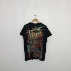 a t - shirt hanging on a hanger with the words, christian brothers written across it