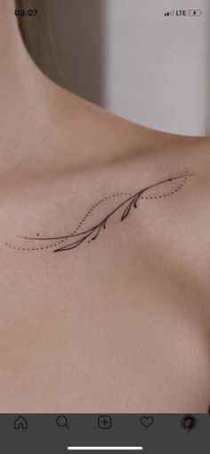 the back of a woman's shoulder with lines on it