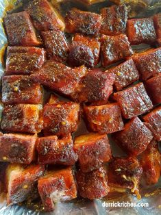 some meat cubes are sitting on top of tin foil and ready to be cooked