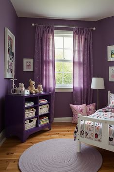 a bedroom with purple walls and wooden floors