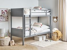 there is a bunk bed with two sets of mattresses on the top and bottom