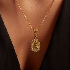 Length: 18" Pendant Drop: 1.5” Lobster clasp closure Gold Filled Cubic Zirconia Stones Guadalupe Necklace, Zodiac Pendant Necklace, Baguette Ring, Zodiac Pendant, Coin Necklace, Chain Ring, Lobster Clasp, Gold Filled, Cubic Zirconia