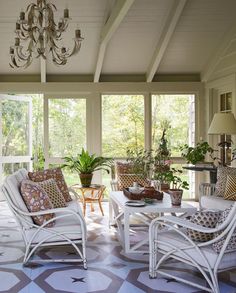 the sun room is clean and ready for guests to use it as an outdoor space