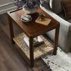 a living room with a couch, chair and coffee table