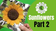 a sunflower made out of aluminum foil