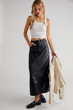 So sleek with an effortless touch of moto edge, this maxi skirt is sure to stun with every wear.**Fit:** High-rise, relaxed silhouette **Features:** Buttery vegan leather fabrication, zip fly and button closure, side pockets, back yoke seam for added shape, ankle-length **Why We <3 It:** Create the perfect off-duty look by dressing it up with strappy heels or down with classic sneakers. Free People Aesthetic, City Slickers, Column Skirt, Black Maxi Skirt, Skirt Trends, Pattern Texture, Free People Skirt, Black Maxi, Latest Fashion For Women