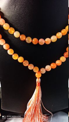 108 Beads/AAA Natural Orange Jade Round Beads Highly Polished Japa Mala Prayer Beads Japa Mala Guru bead Necklace,Jewelry Making Crafts For Gift Stone :Natural Orange Jade Shape :- Round Size :- Approx 8mm Polish :- Handmade Purity :- 100% Natural Gemstone color - Orange Color makes a great gift for your loved ones. It is known as the 'love stone' as the message it emits is the strong vibration of unconditional love, joy, warmth and healing. As quartz crystals are profound amplifiers of energy, Spiritual Hand-strung Amber Beaded Necklaces, 8mm Amber Beads For Spiritual Use, Multicolor Polished Beads Bracelet For Meditation, Orange Jewelry With 108 Beads For Meditation, 8mm Amber Spiritual Beads, Multicolor Polished Beaded Bracelets For Meditation, Spiritual Amber Round Beads, Orange Spiritual Necklace With 108 Beads, Handmade Orange Beaded Bracelets For Meditation