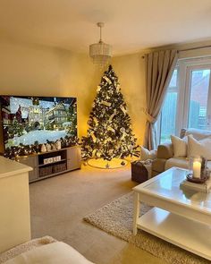 a living room filled with furniture and a christmas tree in front of a flat screen tv