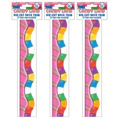 three different colored toothbrushes are shown in the packaging for candy land, which is also