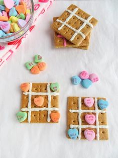 cookies and marshmallows are arranged on a table