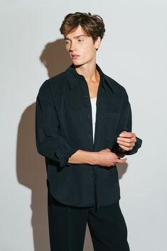 Inspired by the effortlessly cool proportions of the 90's. This is our modern take on a classic button-down shirt with dropped shoulders, an ultra-relaxed cut and boxy silhouette. Also available in Cream & Pistachio. Pleated Shirt Outfit Men, Mens Casual Button Down Shirts Outfit, Relaxed Fit Shirt Men, Men’s Black Button Down Shirt Outfit, Men’s Button Down, Mens Black Button Up Outfit, Guy Portrait Poses, Loose Button Up Shirt Outfits Men, Men’s Oversized Shirt